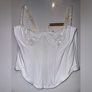 This is a brand new Cotton Corset top from Skims. Never been worn. Size large.